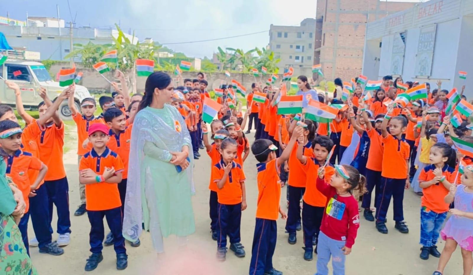 Students waving the tricolour on Independence Day